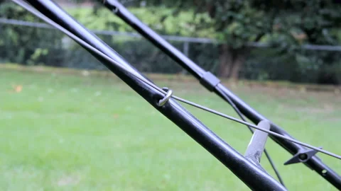 Pulling Lawnmower Cord Stock Footage 307703886