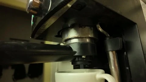 Pulling the lever out of the lever coffee maker. Breaking the lever out of the Stock Footage 276512832