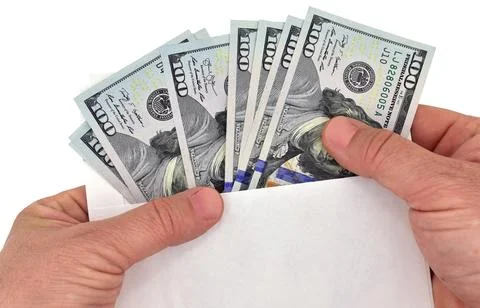 Pulling Money Out of a Envelope Stock Photos