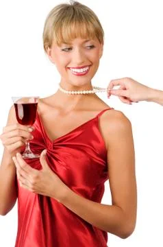 Pulling necklace Stock Photos