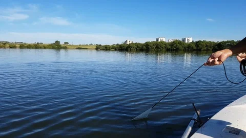 Pulling the net back into the boat. Stock Footage 120047116