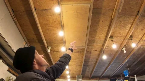 Pulling Open a Wooden Attic Ladder Stock-Footage 146243559
