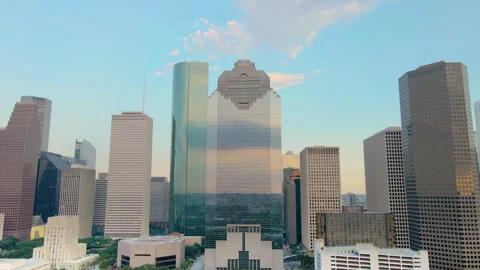 Pulling out aerial shoot downtown Houston Texas revealing. Establishing Stock Footage 286329939