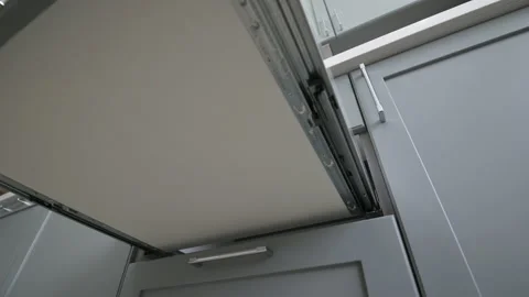 Pulling out and closing the drawer at modern classic gray kitchen Stock Footage 155443546