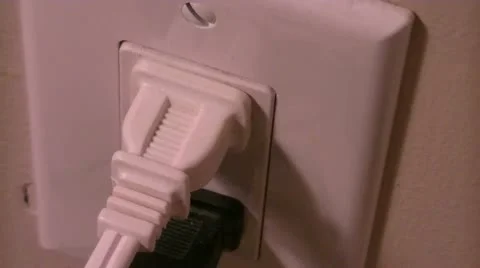 Pulling Out an Electrical Cord Stock-Footage 11689600