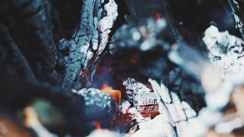 Pulling out of a fire pit. Stock Footage 241288483