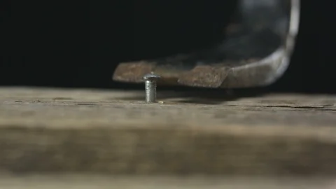 Pulling out a Nail Stock Footage 99703126
