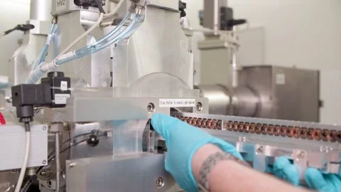 Pulling in Samples for Examination / Research Vídeo Stock 145055876