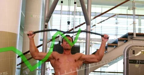 Pulling shirtless muscular man performing lat pulldown at gym, with curved bar Stock Photos