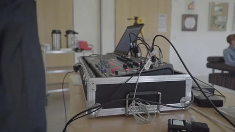 Pulling in on Sound Equipment on Desk Stock Footage 203918225