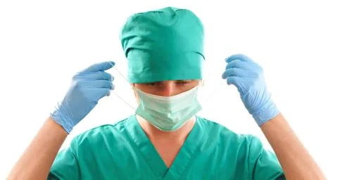 Pulling on surgical mask Stock Photos