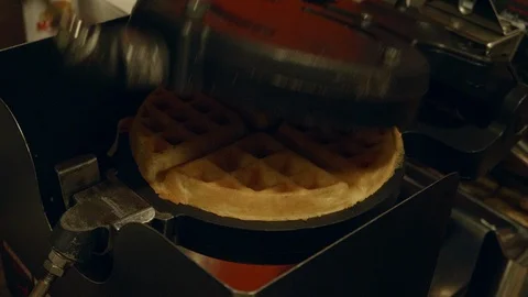 Pulling Waffle out of Waffle Maker Stock Footage 99918087