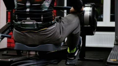 Pulling weights in a gym Video stock 86994294