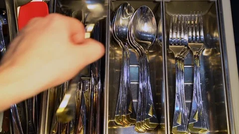 Pulls out the closet and takes a spoonful 库存影片 75687734