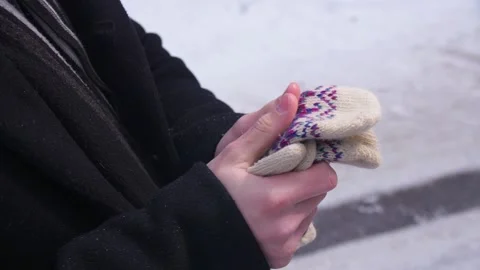 Pulls out Mittens From his Pocket. Close-up Stock-Footage 163466798