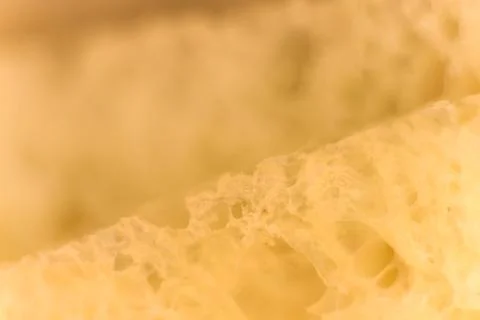 Pulp of bread macro closeup. Texture background. Slice section. Corner. Stock Photos