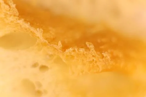 Pulp of bread macro closeup. Texture background. Slice section. Corner. Stock Photos