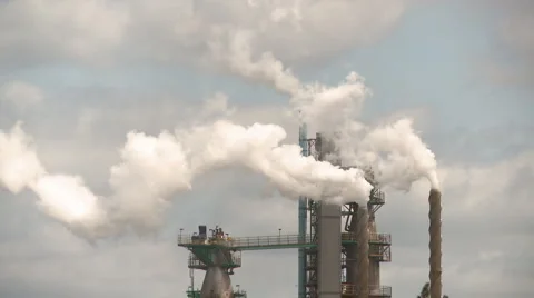 Pulp mill chimney stacks  Stock Footage 946174