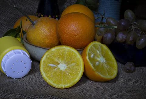 Pulp orange slice with salt and fruit arrangement Stock Photos