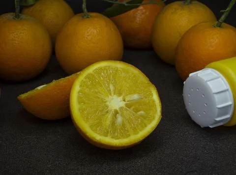 Pulp orange slice with salt and fruit arrangement Stock Photos