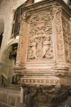 Pulpit in Plateresque style in the interior of St. Andrew's church in Villa.. Stock Photos