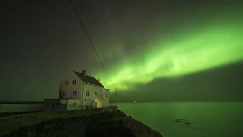 Pulsating Aurora Borealis with lighthouse Stock Footage 266917060
