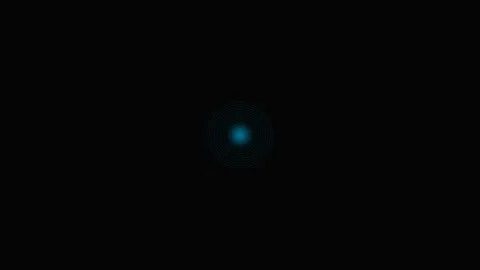 A pulsating blue light orb set against a deep black background environment Stock Footage 339616499