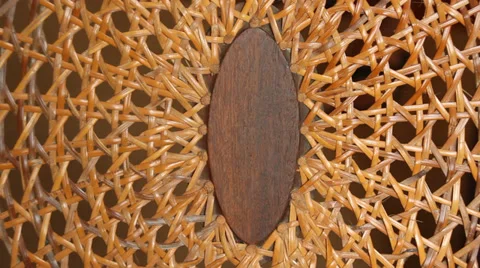 Pulsating vibrating back of vintage wicker chair Stock Footage 34265180