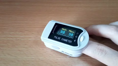 Pulse oximeter fingertip saturation Stock Footage 160216108