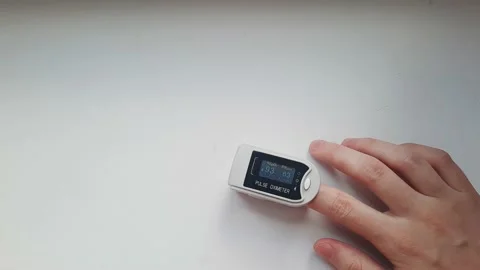 Pulse oximeter measure oxygen saturation Stock Footage 160216126