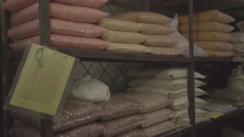 Pulses packets on rack in grocery store Stock Footage