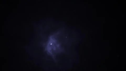 Pulsing abstract thunder light effect with cloud on dark background Stock Footage 333502351