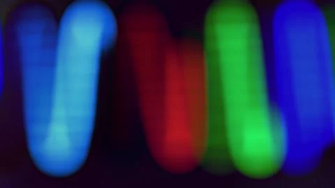 Pulsing multicolored curved neon lines on light leaks Stock Footage 294008438
