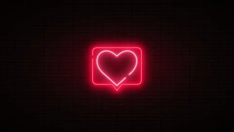 Pulsing Neon Heart in Speech Bubble on Brick Wall Видео 331035837