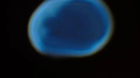 A pulsing spot of light Stock Footage 148045577