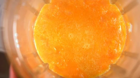 Pulverised cooked pumpkin in a mechanical blender Stock Footage 105864353