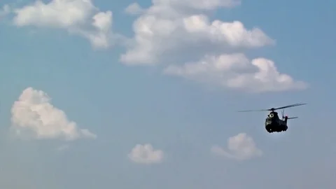 Puma helicopter pilots training in the blue sky, side view. Stock Footage 81068810
