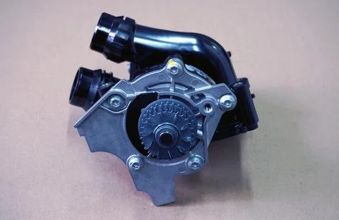 The pump of the cooling system of a modern car. Stock Photos
