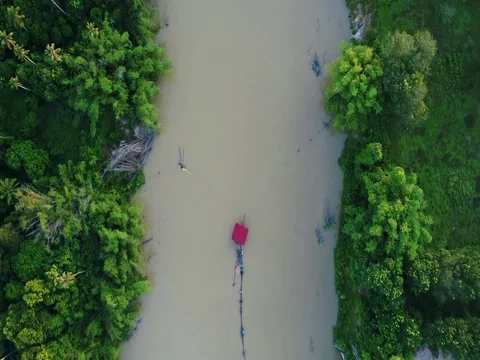 Pump house was constructed in the river to excavate sand for industrial usage. Video stock 80459801