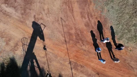 Pump Jack and Workers Shadows Stock Footage 333692711