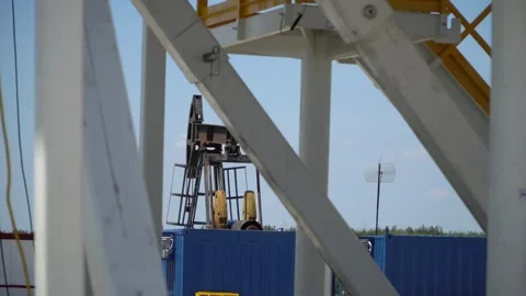 . Pump Jack Extracting Crude Oil from a Oil Well. Stock Footage 278807080