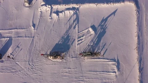 Pump jack in vast oil fields in winter. Pipelines transporting oil from oil Stock Footage 172538157