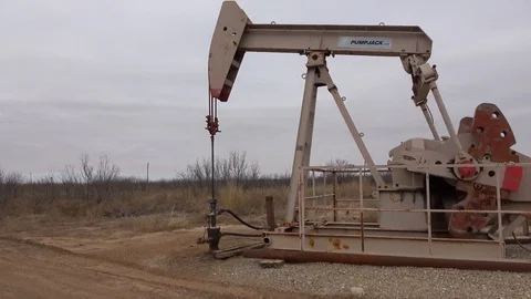 Pump jack working In the oil field. Video stock 85711545