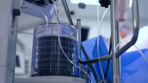 Pump of lung ventilating machine pumping air to the patient. Close up. Medical Stock Footage 340928934