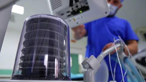 A pump of a lung ventilator machine starting to move.  Stock Footage 229869320