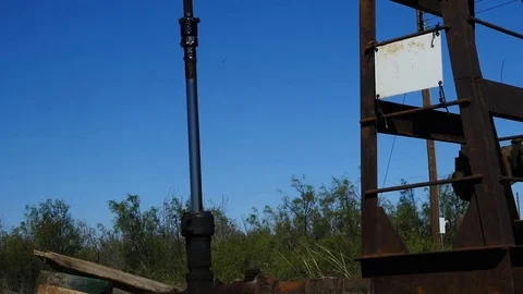 Pump piston close up on a pump jack oil rig Stock Footage 77551872