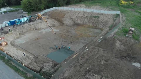 A pump pouring concrete at the construction site Stock Footage 145753690