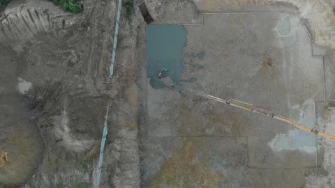 A pump pouring concrete at the construction site Video stock 145753861