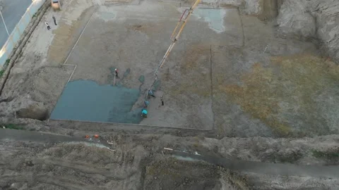 A pump pouring concrete at the construction site Stock Footage 145753939