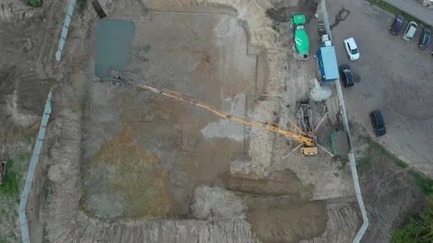 A pump pouring concrete at the construction site Stock Footage 145754018